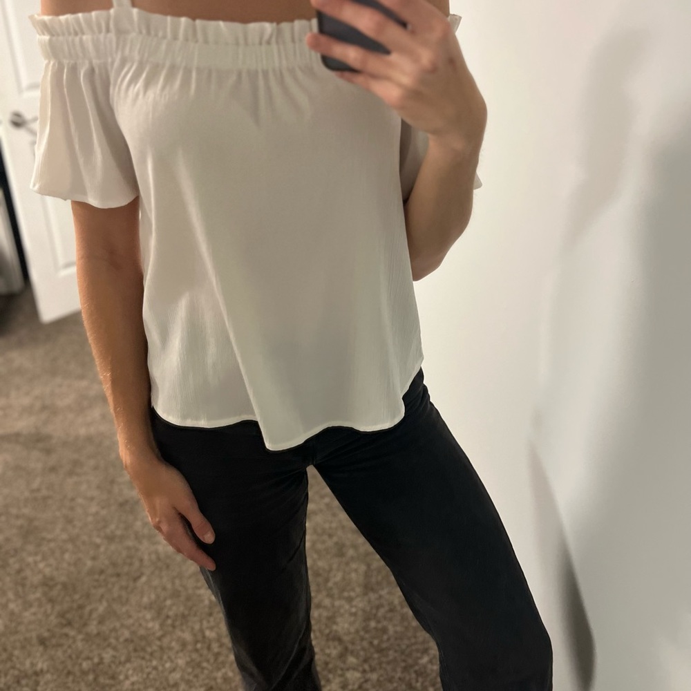 Noisy May top